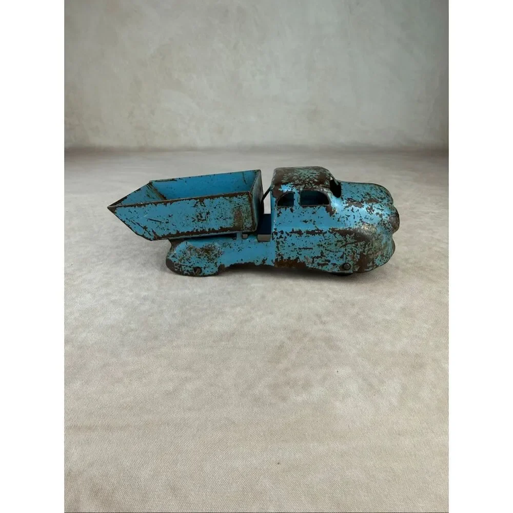 Vintage 6in Blue Wyandotte Pressed Steel Dump Truck Toy READ